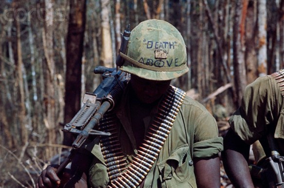US Soldier Wearing Helmet with Message