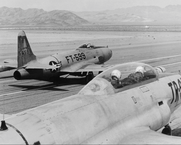 Lockheed QF-80 drone (FT-599) and director aircraft (a Lockheed DT33) ready for take-off at Indian Springs